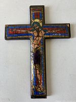 Front view of enameled crucifix showing full design