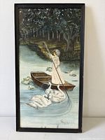 Front view of framed watercolour lady with swans