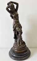 Full view of bronze nude nymph sculpture front
