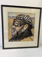 Front view of framed mixed media portrait