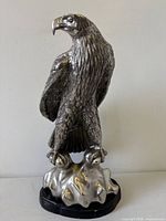 Full view of silvered bronze eagle sculpture on base