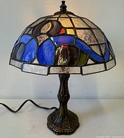 Lamp lit showing full view with base and cord