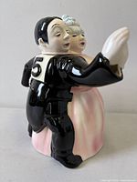 Front angled view of ceramic ballroom dancers teapot