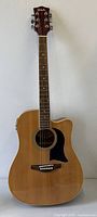 Front view of Washburn Lyon acoustic-electric guitar full length