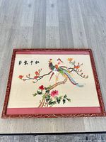 Full view of framed silk embroidery