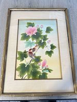 Entire framed artwork showing birds and blossoms
