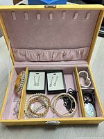 Open jewelry box showing all contents