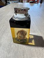 Full view of lighter showing acrylic block base and lighter insert