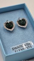 Both heart earrings in box labelled Swarovski Elements