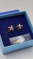 Earrings in blue box showing front view and Swarovski Elements label