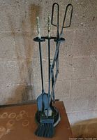 full view of stand with four tools