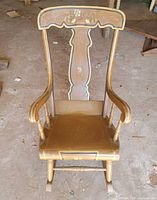 Front view of wooden rocking chair showing overall structure and finish
