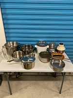 Full lot on table showing all cookware and appliances