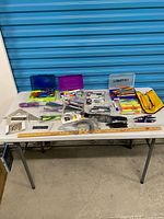 Overview of table with assorted office and school supplies