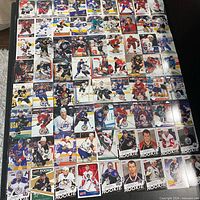 Overview of first portion of hockey cards laid out in rows