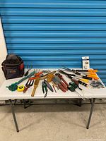 Full lot on table displaying all tools and accessories