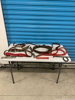 Overall view of the horse tack items on table