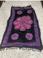 Full view of pareo showing overall design and fringe