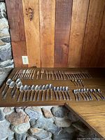 Flatware laid out showing all 42 pieces