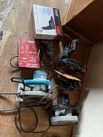 Overview of all five corded tools on floor