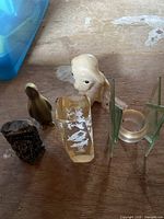 Group of various small decorative items on table