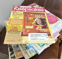 Stack of Creating Keepsakes magazines showing assorted issue covers