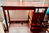 Desk front view flat top showing shelves and drawers