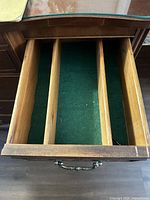 open felt-lined divided right upper drawer