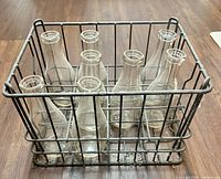 Front angle of crate holding eight bottles