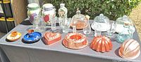 entire selection of canisters, glassware, molds on table