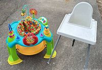 Walker and high chair side by side