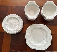 Group view of 4 dinner plates, 6 salad plates, 8 bowls