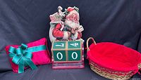 All three items: Santa countdown, velvet pillow, basket