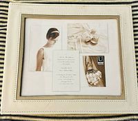 Front of white Umbra photo album showing 8x10 window