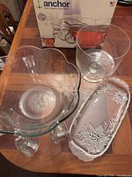 Overall lot showing punch bowl, trifle bowl, poinsettia dish, box