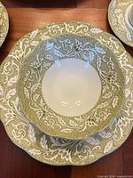 Close-up of soup bowl showing Renaissance green border pattern