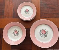 Stacked bowls and plates showing pattern and quantities