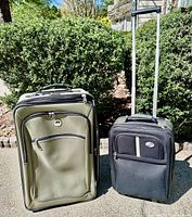 Front view of both suitcases upright