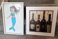 Both wall art pieces side by side showing overall appearance and relative size