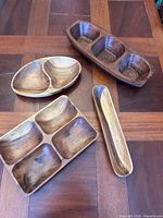 All four acacia wood serving trays displayed