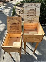 Both wine box tables open showing storage