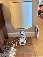 Full view of table lamp with shade and cord