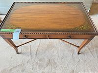 front angled view showing overall table, drawers closed