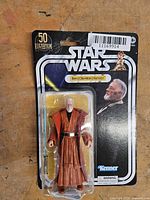 Front view of Ben (Obi-Wan) Kenobi figure in sealed carded packaging