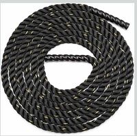 Coiled black battle rope showing 3-strand twist and heat-shrink handle
