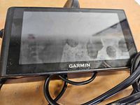 Front view showing Garmin logo and touchscreen