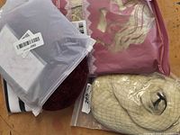 All three sealed wig packages displayed