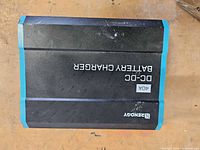 Top view of Renogy 40A DC-DC battery charger showing branding and amperage rating