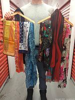 Front view showing all 10 scarves on two hangers