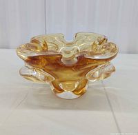 Front view of amber freeform glass bowl